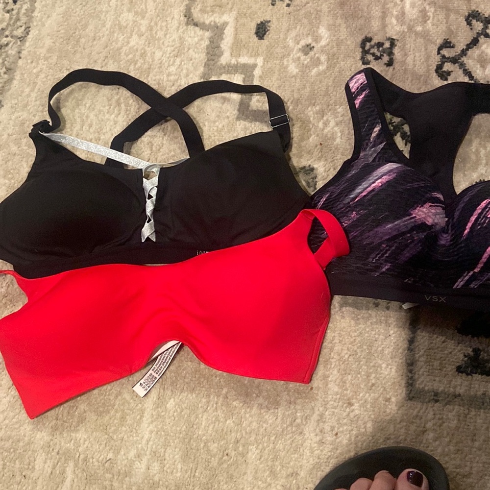 3 different Victoria Secret sports bras.